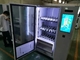 エレベーターの上昇によって冷やされている自動販売機ミクロンのスマートな販売の赤ワインの自動販売機